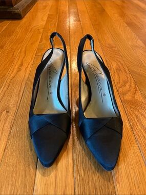 Caressa’s Black Satin Pointed Slingback Pumps